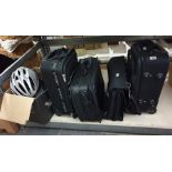 Three various suitcases a Samsonite laptop bag, a cycle helmet and a motorcycle helmet (5)