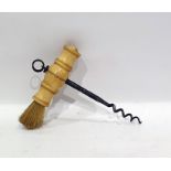 19th century corkscrew with turned ivory handle and brush to the side