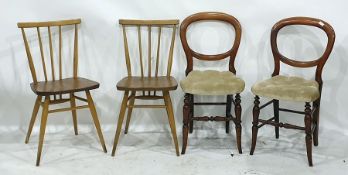 Pair of elm seated stickback dining chairs in the manner of Ercol and a pair of Victorian balloon-