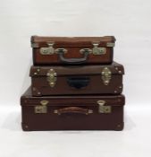 Three vintage luggage cases containing Wills and Players cigarette card albums, theatre programmes