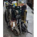 Three various golf bags, golf trolley, golf clubs, golf umbrella, etc