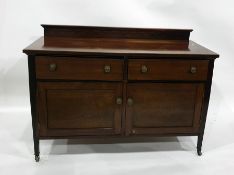 Early 20th century mahogany sideboard, the rectangular top above two drawers and two cupboard doors,