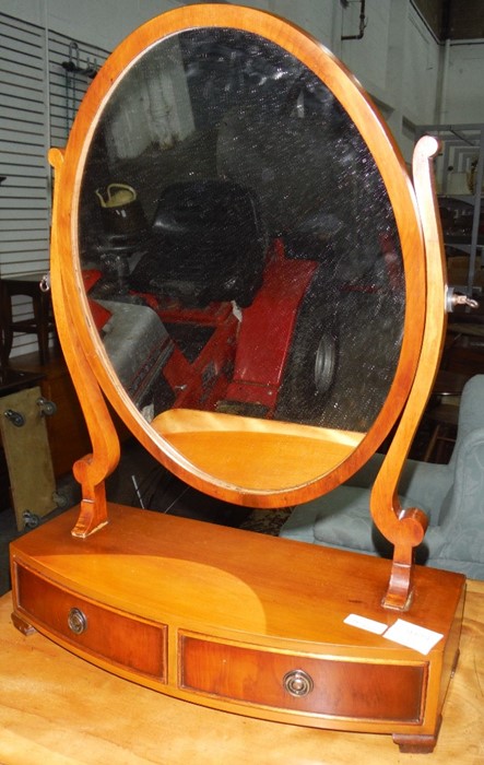 Modern dressing table mirror with bow front to two drawers on ogee bracket feet