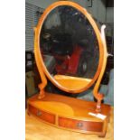 Modern dressing table mirror with bow front to two drawers on ogee bracket feet