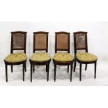 Set of six French style mahogany and kingwood inlaid, caned back dining chairs, having cross-