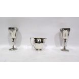 Pair of silver wine goblets, Birmingham 1969, engraved with grapes and vine leaves and a silver milk