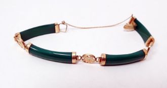 Chinese gold and hardstone bracelet with four curved bars of dyed chalcedony, with Chinese character