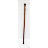 Bamboo cane with decorative silver coloured metal handle