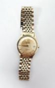 Omega Constellation automatic chronometer gent's wristwatch with yellow metal strap