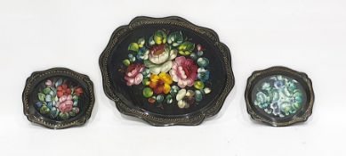 Three assorted hand-painted tin trays with foliate decoration (3)