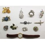Assorted costume jewellery including brooches, watch, a silver plated bookmark, a silver plated