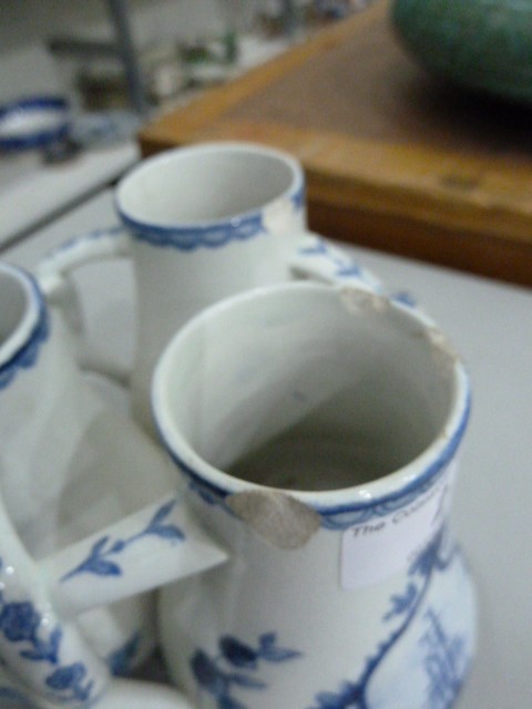 Delft fuddling cup with three beakers, of baluster form with interlocking handles, underglaze blue - Image 6 of 6