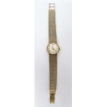 LOT WITHDRAWN Caravelle lady's 9ct gold bracelet watch with circular dial, on integral woven
