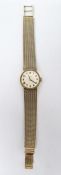 LOT WITHDRAWN Caravelle lady's 9ct gold bracelet watch with circular dial, on integral woven