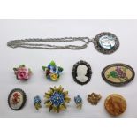 Assorted costume jewellery including brooches, earrings, necklaces, bracelets, a small unused