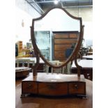 19th century mahogany shield-shaped dressing table mirror on a serpentine fronted and cross-banded