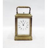 French brass striking carriage clock, with Roman numerals to the dial
