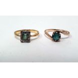 18ct gold, green stone and diamond dress ring set central rectangular green stone surrounded by