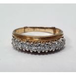 18ct gold band ring set with nine brilliant cut diamonds, finger size T