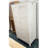 White painted two door cupboard, the interior with shelf and hanging space, width 93cms