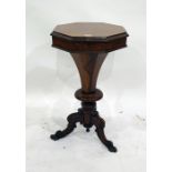 19th century rosewood octagonal-top sewing table, the moulded edge above the lift top enclosing