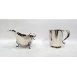 Silver mug by S Blanckensee & Son Ltd, Chester 1931, of plain tapering form and a silver cream jug