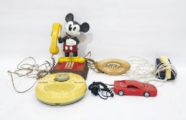 Mickey Mouse character telephone, a Decca wall radio, a telephone by Betacom in the form of a