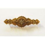 15ct gold and diamond bar brooch, scroll wire applied to the matt ground, set with small old cut