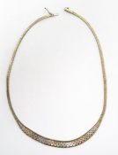 9ct three-colour gold necklace with textured brick links, approx 17g