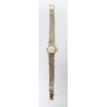 Lady's Omega 'Ladymatic' wristwatch with subsidiary date aperture, 9ct gold strap
