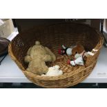 Wicker dog basket and various soft toys