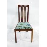 Oak Arts & Crafts style single chair with carved and pierced toprail, bent stickback, removable