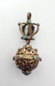 Late 19th/early 20th century gilt metal pomander, the hinged spherical body with pierced foliate