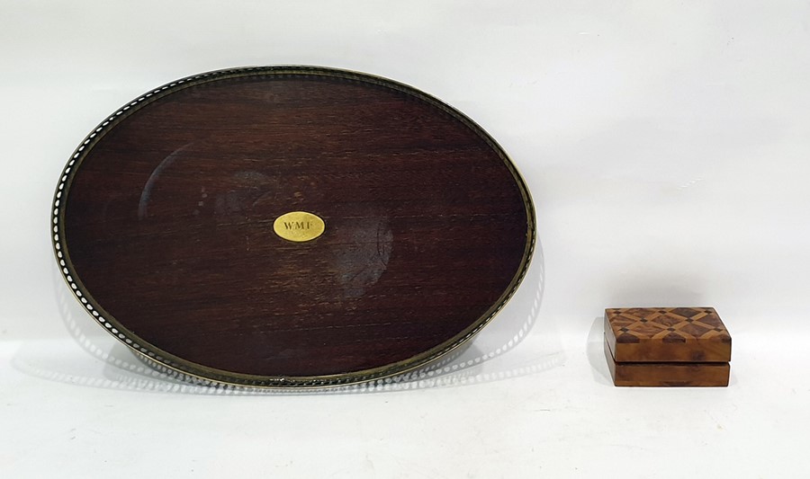 Early 20th century mahogany and brass galleried tray with central brass oval plaque, marked 'W.M.F.'