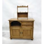 Contemporary pine cupboard with moulded edged top, open shelf, two short drawers with cupboards