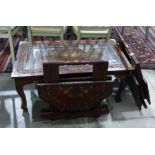 20th century Eastern hardwood, foliate carved and brass inlaid coffee table and two similar