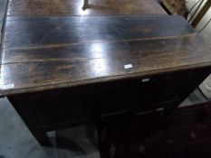 18th century oak blanket chest, the moulded edge opening to reveal candle box, three foliate