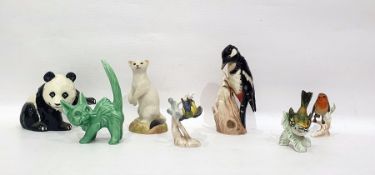 Beswick model of a panda, Goebel model of woodpecker on branch and further decorative models of