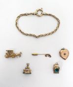 9ct gold section of chain bracelet, approx 8.3g, two 9ct gold charms, a 9ct gold heart-shaped locket