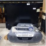 Goodmans flatscreen television, 19", a Sony CD player and a Roberts portable radio (3)
