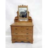 Victorian pine mirror-back chest of three long drawers, with trinket shelves, raised on bracket