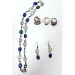 Azurite bead necklace, the beads interspersed with circular metal links and a pair of matching