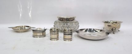 Silver pin dish of circular form, with two pierced handles, a white metal ashtray with central