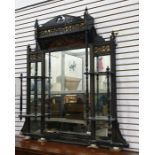Late Victorian overmantel mirror with black lacquer and gilt decoration, broken arch pediment,