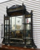 Late Victorian overmantel mirror with black lacquer and gilt decoration, broken arch pediment,