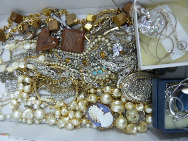 Quantity of costume jewellery including faux pearls, brooches, a fitted faux suede jewellery box