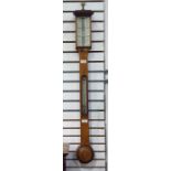 Victorian oak stick barometer, with twin 24 hour silvered pressure dials, temperature dial below,