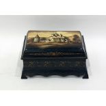 Russian Fedoskino lacquer decorated box featuring building with figures conversing outside,