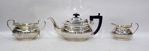 Silver three-piece tea set by Henry Matthews, Birmingham 1927, comprising teapot, two-handled