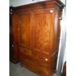 19th century mahogany linen press, the two doors enclosing linen drawers, upon a base of two short